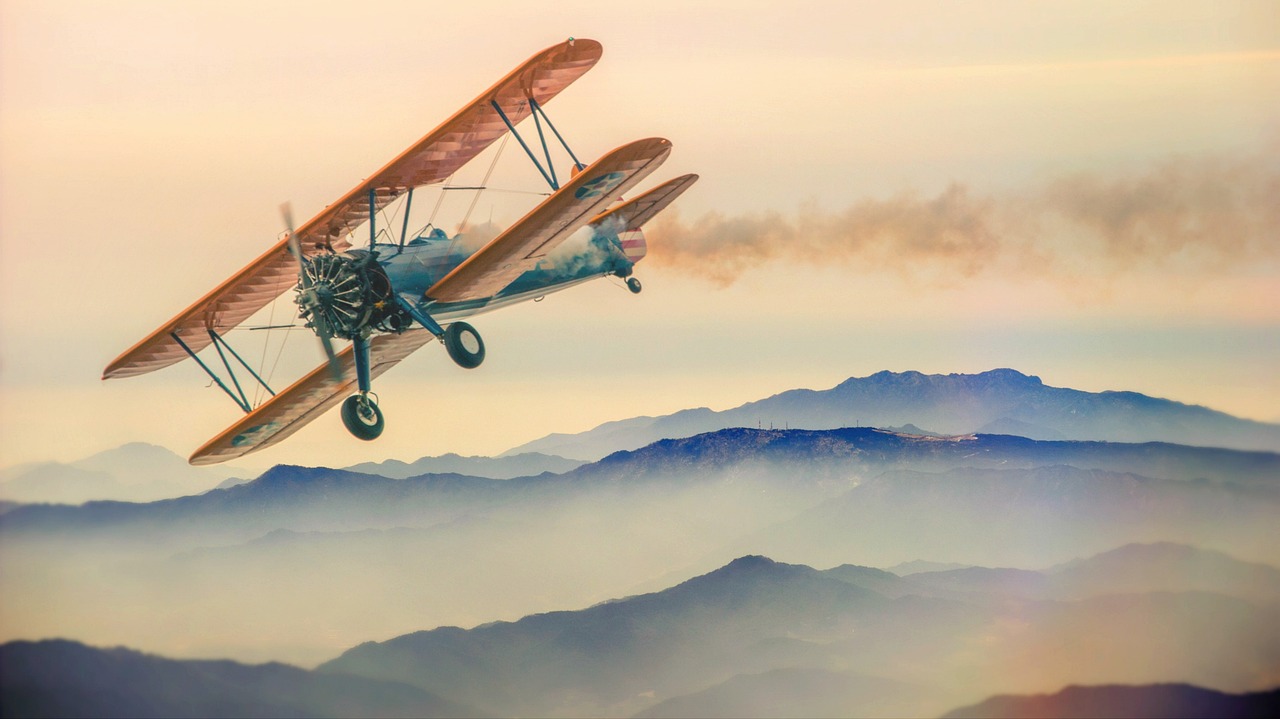 double decker plane mountains fog heaven clouds planes antique car flying propeller small planes light aircraft landscape nature summit top