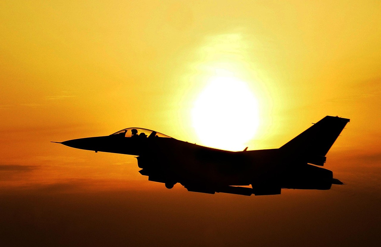 sunrise airplane fighter silhouette sun dusk twilight aircraft flight flying air force us air force sky nature jet military defense